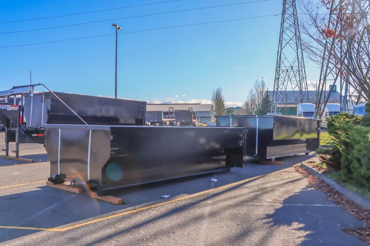 Roll-off dumpster ready for waste disposal at job site for 15 Yard Dumpster Rental in Rock Falls